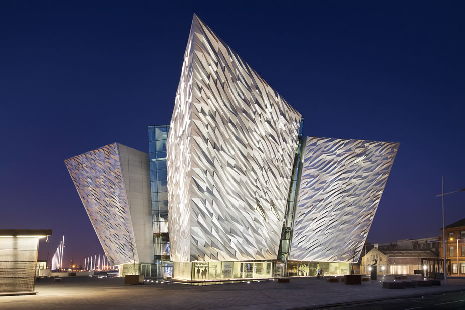 Architecturally striking building, consisting of three pointed sections covered in wave detailed panelling