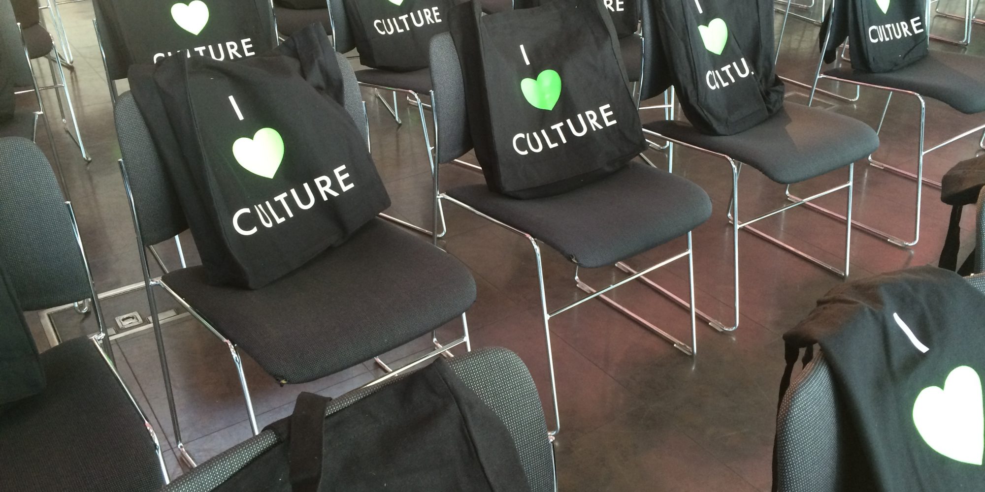 'I Love Culture' totes bags sitting on chairs. Naming ourselves CT Consults