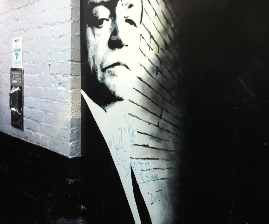 Painted black and white mural in a bar