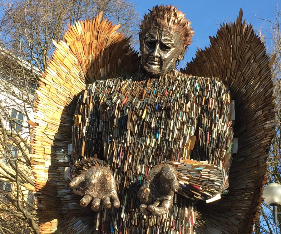 Sculpture of angel with wings, composed of knives