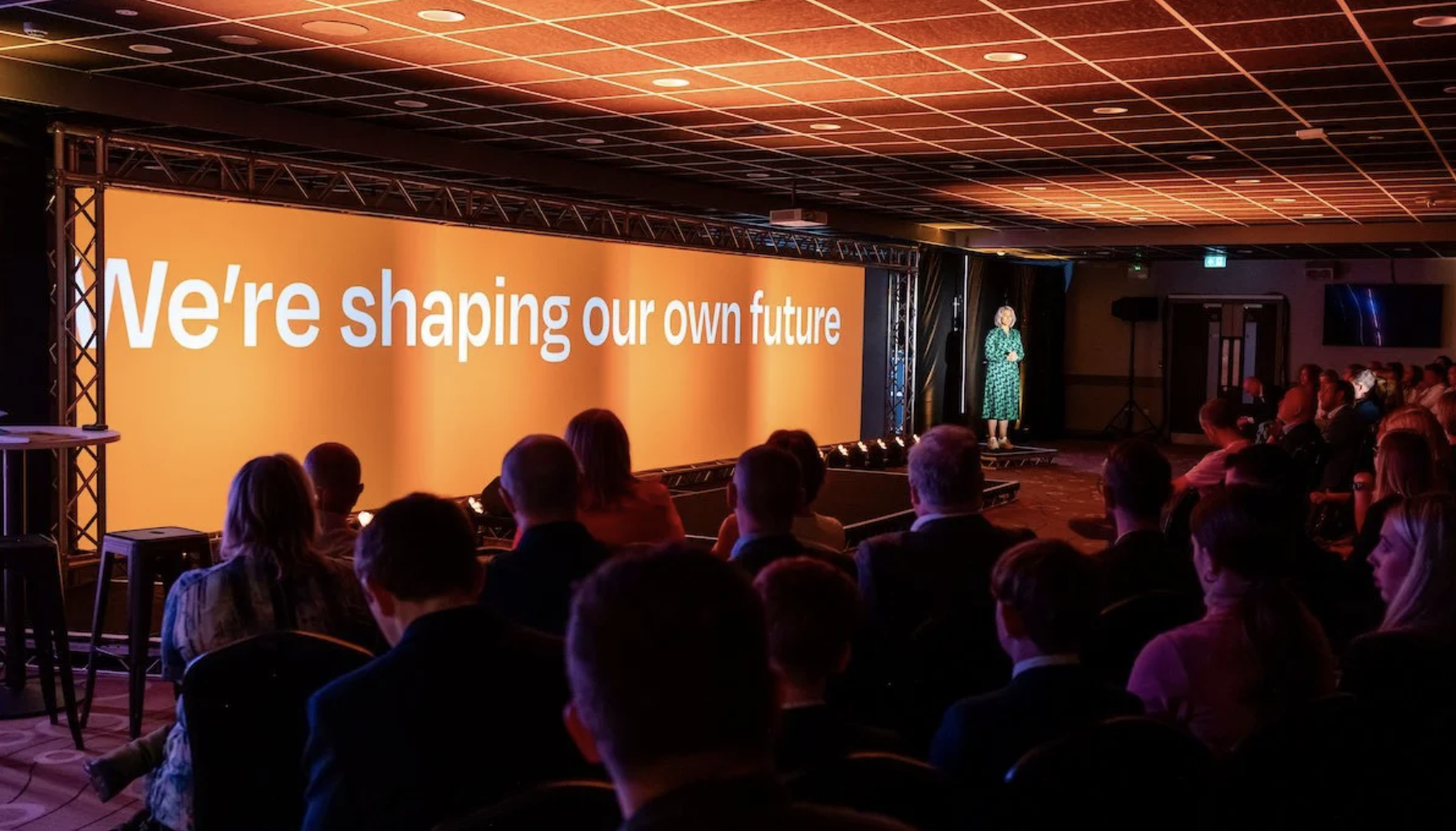 An audience looking at a presentation